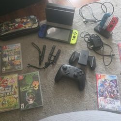 Nintendo Switch W/ Games And Extra Controllers