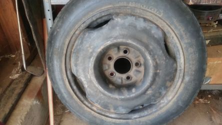 16" Toyo spare tire and 5 lugs & rim