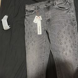Purple brand jeans embodied logo