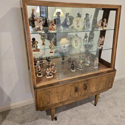 European Curio With Assorted Hummels