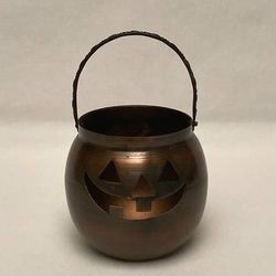 Vintage metal Halloween jack-o-lantern pumpkin tea light candle holder Hosley?