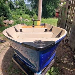 Grumman 14 foot Aluminum boat with trailer.