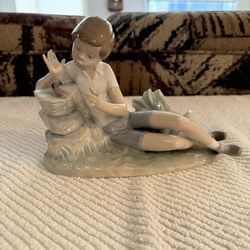 Lladro #4858 “Pleasant Encounter” Boy with Bird