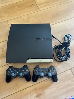 Sony PlayStation 3 Slim Console with 2 Controllers