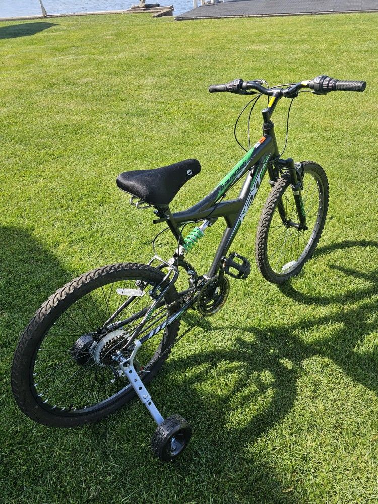 Mountain bike with training wheels for 9-12 year old