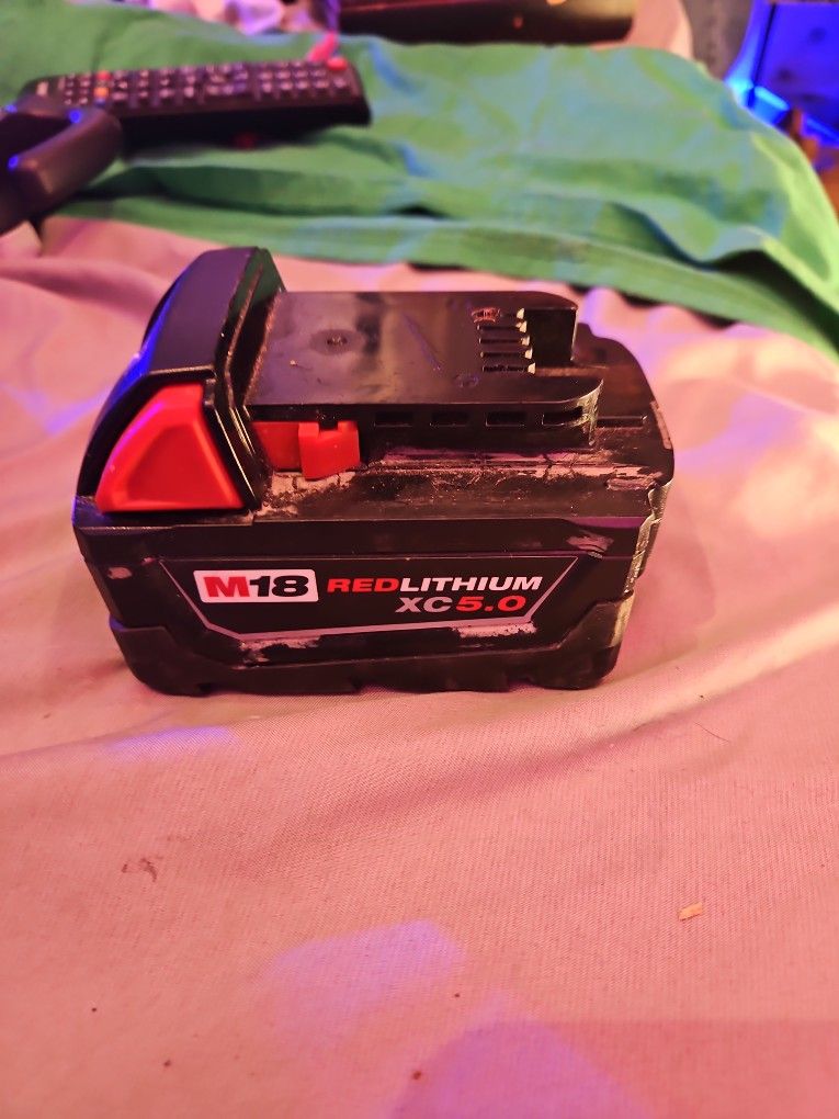 Milwaukee Red lithium Battery And Charger