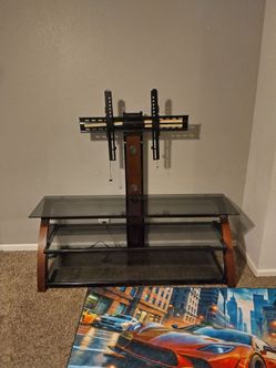 Nice good condition pivotal TV stand for up to 70-in TV