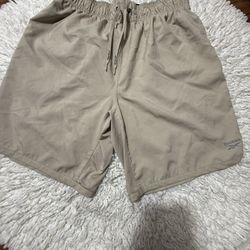 Rebook mens shorts  Large on tag  Flaws as seen in last pictures (very small spot only)