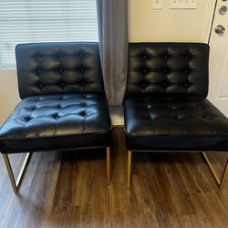 Two Black Leather Chairs 