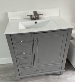 Vanity With Sink and Faucet