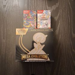 Pokemon evolutions trainer box with prismatic evolutions in phantasmal flames