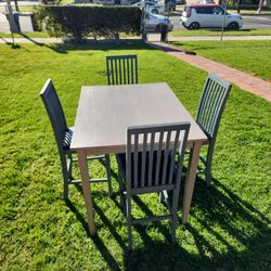 Table And 4 Chairs 