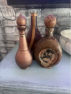 Old leather wrapped bottles prices for all