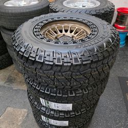17" LOCK MOJAVE bronze w/ 32" Kumho RT tires. 17x9 265-70R17