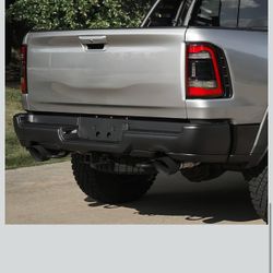 New in box DNA MOTORING Rear Bumper Assembly Compatible with 19-24 Ram 1500, W/Dual Exhaust Cutout, CH1103163, Black, RBUM-RAM19-01-BK