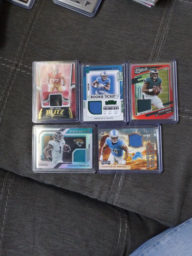 5 Card Jersey Lot, Hurts, St. Brown, Bosa, Etienne 