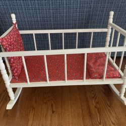 DOLL CRADLE,WHITE PAINTED WOOD,RED FLORAL BEDDING, 25.5L X 18.5H X 18.5W