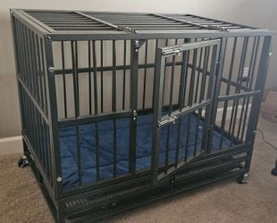 Dog kennel - on wheels; fits through a standard doorway