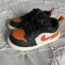 Orange , black todlers size 7 1/2