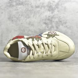 GUCCI Rhyton printed leather sneakers
