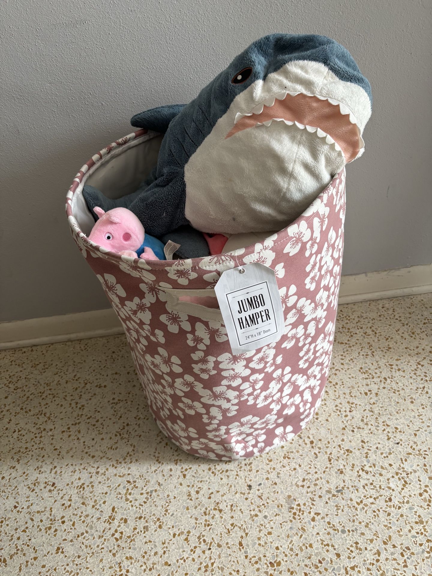 Stuffed animals and hamper