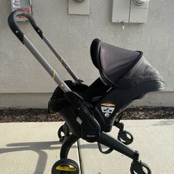 Doona car seat stroller comes WITH BASE