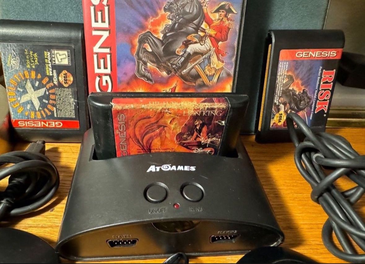 Sega Genesis 16 Bit video entertainment system /game console includes lion king  game and 2 more. In great condition, still works perfectly. 