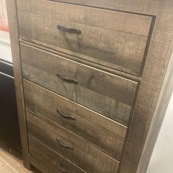 Classy 5 drawer Dresser from Ashley Furniture selling for $549 in walnut/ espresso finish