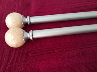 Single Curtain Rods with elegant yellowish/cream marble ball finials.