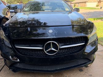 Mercedes-Benz Black Sedan with Front Damage