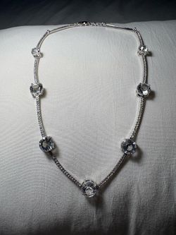 Kate Spade clink of ice statement necklace in silver tone.