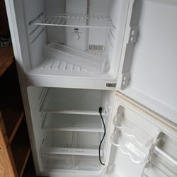 Apartment size refrigerator.