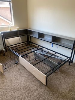 Bed frame with wire drawers