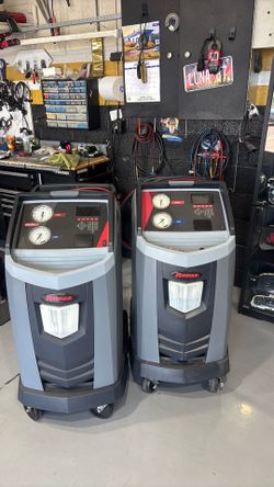 AC automotive evac and recharge with profesional robin air machines.