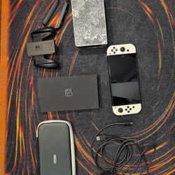 Nintendo Switch OLED + Pro Controller+ dbrand + travel case