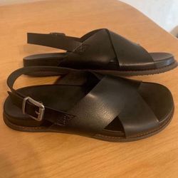 Black faux leather sandals