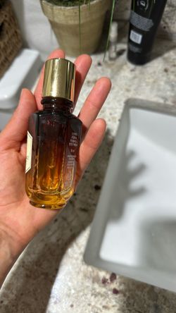 EMPTY glass bottle that had skincare can repurpose