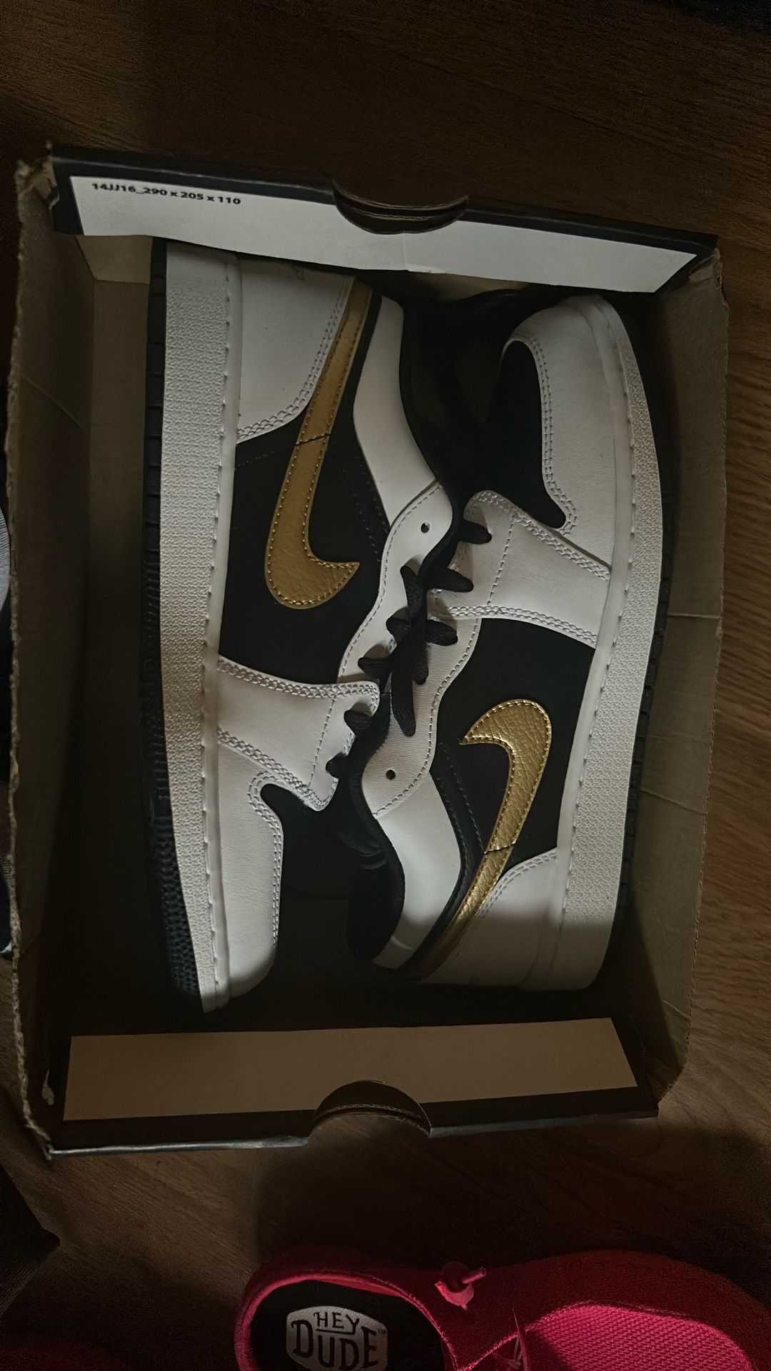 Low Top Air Jordan 1’s Black And White With Gold Nike Logo
