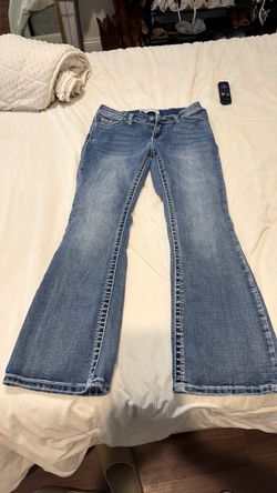 Women’s jeans with bedazzled pockets size M