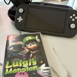 Gray Nintendo Switch Lite  w/accessories and Luigis Mansion 2 HD