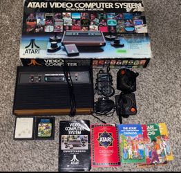 ATARI 2600 CONSOLE WITH VIDEO GAME & CONTROLLER