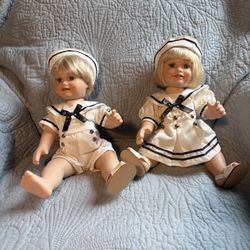 $10 Pair Of Sailor Dolls, Sitting 8 Inches Tall Absolutely Adorable With Blonde Hair Blue And White Outfits Missing One Shoe