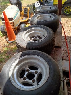 4 used 10"golf cart wheels