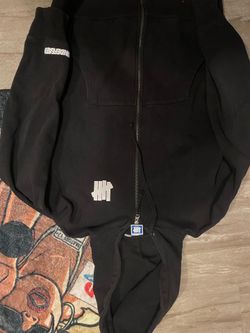 Undefeated zip up size Medium