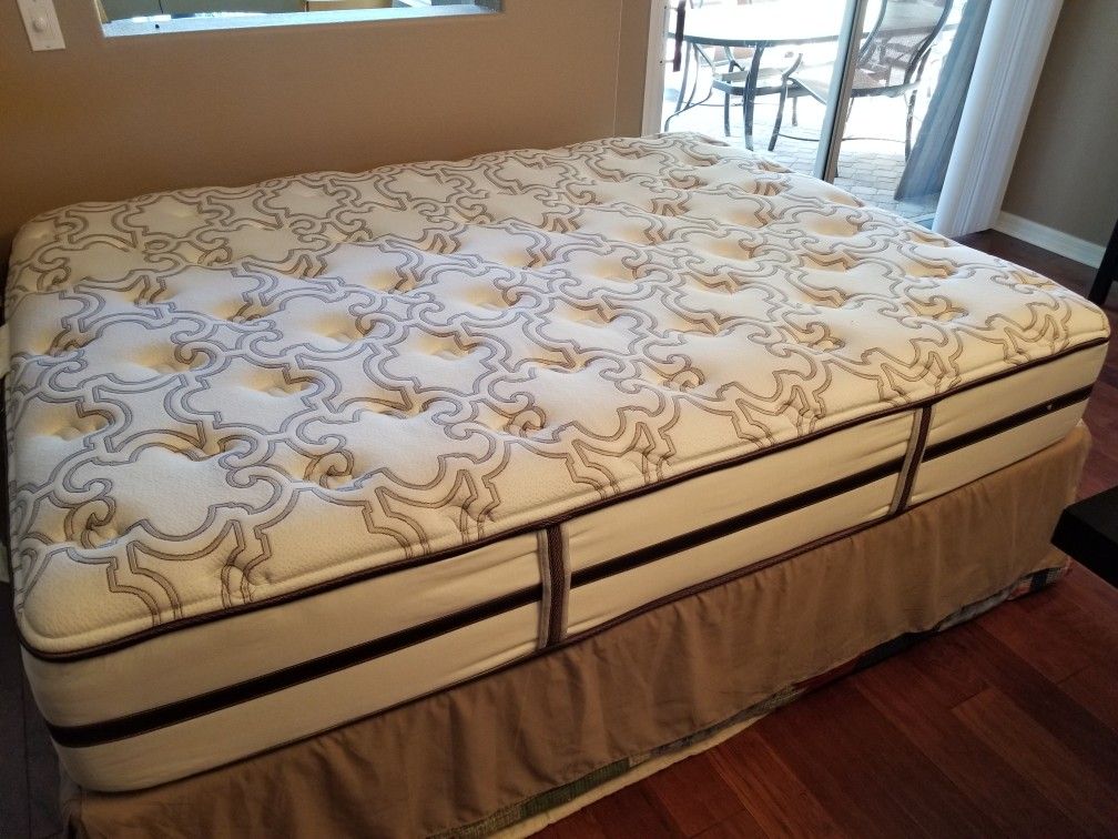 Simmons beautyrest connoisseur collection queen mattress with 2 box springs, frame and wrought iron headboard in excellent condition.