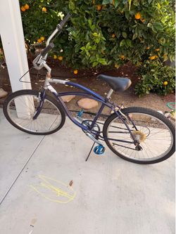 Blue Schwinn Beach Cruiser
