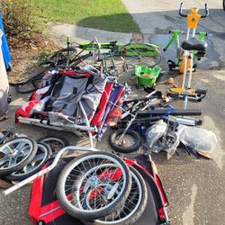 Lots of bike bicycle parts trailers wheels etc. $30 FIRM for everything must take all