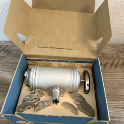 New vintage aluminum cookie and pastry press with 8 form plates and pastry tip Price is firm, cash only