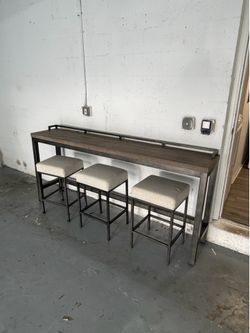 Bar with three stools