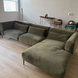 Green velvet sofa